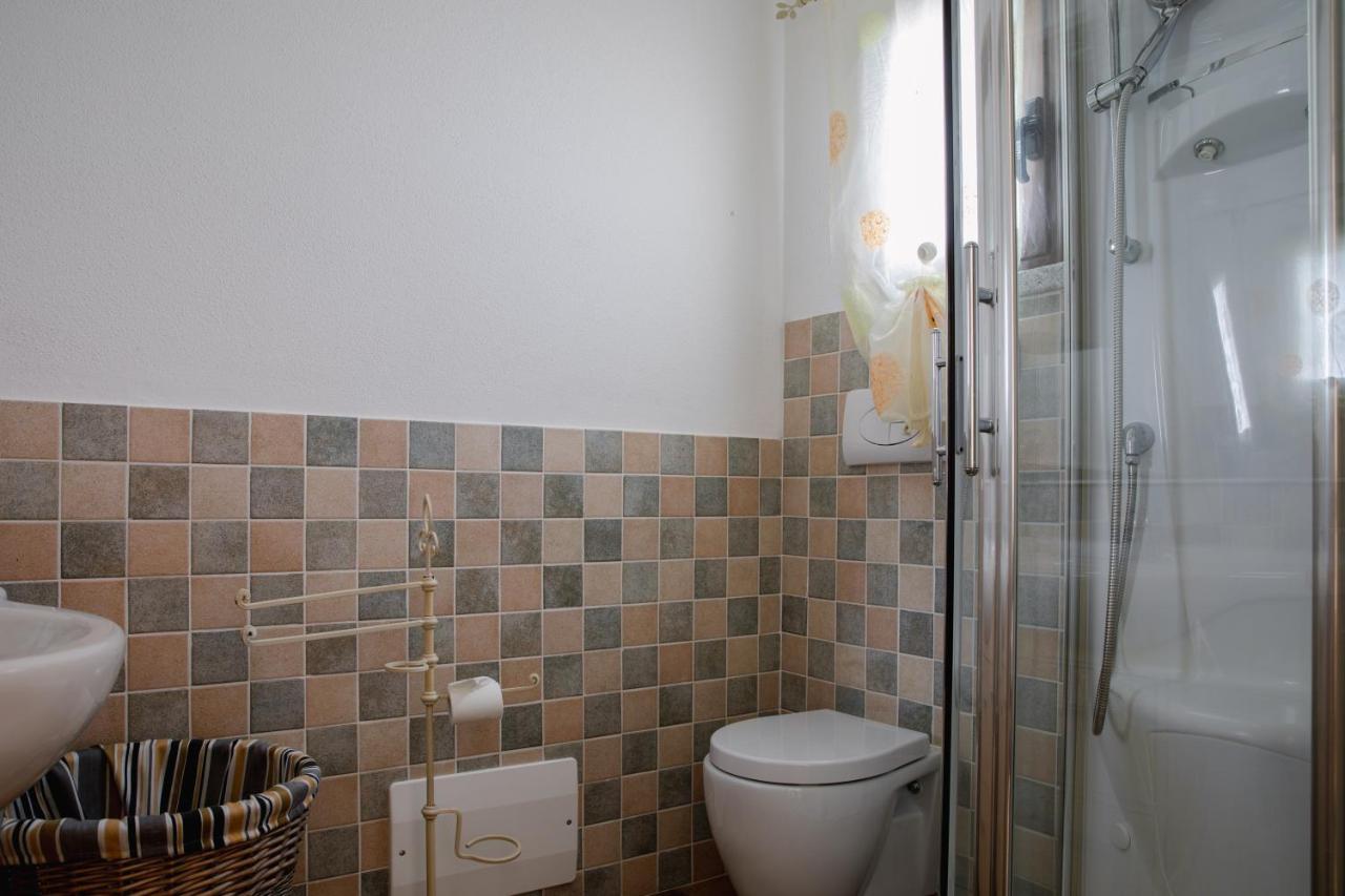 Le Residenze Di Baia Sant'Anna Villa Tanaunella Eksteriør billede